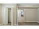 Bedroom featuring carpet, closet, and connecting hallway, offering ample storage and space at 270 Hunt Ridge Dr, Stockbridge, GA 30281