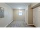 Cozy bedroom featuring carpeted floors and a window for natural light, exuding warmth at 270 Hunt Ridge Dr, Stockbridge, GA 30281