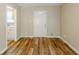 Dining area with wood-look floors and a doorway to the kitchen at 270 Hunt Ridge Dr, Stockbridge, GA 30281
