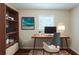 Well-lit office space featuring a desk, bookshelf, and natural light, promoting productivity at 270 Hunt Ridge Dr, Stockbridge, GA 30281