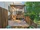 Multi-level deck provides ample space for outdoor enjoyment and seating options at 5100 Sunset Maple Trl, Lilburn, GA 30047