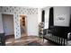 Nicely decorated Bedroom with dark accents and plenty of natural light at 6165 Namon Wallace Dr, Cumming, GA 30028