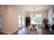Cozy dining area featuring lots of natural light and a view of the backyard at 6165 Namon Wallace Dr, Cumming, GA 30028