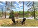 Relaxing backyard with stone patio and tranquil lake views at 1141 Ragley Hall Ne Rd, Brookhaven, GA 30319