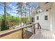 Backyard deck with a view of the lake and surrounding trees at 1141 Ragley Hall Ne Rd, Brookhaven, GA 30319