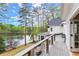 Balcony overlooking lush landscaping and a serene lake, perfect for relaxation at 1141 Ragley Hall Ne Rd, Brookhaven, GA 30319