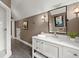Modern bathroom featuring a glass enclosed shower and a sleek, white vanity with storage at 1141 Ragley Hall Ne Rd, Brookhaven, GA 30319