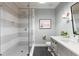 Bathroom showcasing a glass shower, light gray vanity, and modern fixtures at 1141 Ragley Hall Ne Rd, Brookhaven, GA 30319