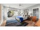 Cozy bedroom with ample lighting and a hanging chair at 1141 Ragley Hall Ne Rd, Brookhaven, GA 30319