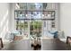 Charming dining area featuring a window seat and views of the lake at 1141 Ragley Hall Ne Rd, Brookhaven, GA 30319