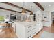 Open kitchen with a large island, marble countertops, and stainless steel appliances at 1141 Ragley Hall Ne Rd, Brookhaven, GA 30319