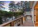 Private deck overlooking a beautiful lake at sunset at 1141 Ragley Hall Ne Rd, Brookhaven, GA 30319