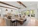 Open floor plan showcasing the living room and kitchen with natural light at 1141 Ragley Hall Ne Rd, Brookhaven, GA 30319