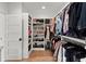 Spacious walk-in closet with custom shelving and ample hanging space at 1141 Ragley Hall Ne Rd, Brookhaven, GA 30319