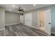 Spacious bedroom with a ceiling fan, laminate floors, closet, and ensuite access at 1050 N Carter Rd, Decatur, GA 30030