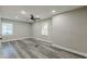 Bright bedroom with a ceiling fan, laminate floors and two windows at 1050 N Carter Rd, Decatur, GA 30030