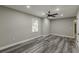 Bright bedroom with a ceiling fan, laminate floors and a window at 1050 N Carter Rd, Decatur, GA 30030