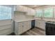 Beautiful kitchen with white cabinets, quartz countertops, and new stainless steel appliances at 1050 N Carter Rd, Decatur, GA 30030