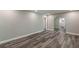 Open-concept living room featuring hardwood floors and neutral paint, offering a versatile living space at 1050 N Carter Rd, Decatur, GA 30030