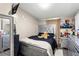 Bedroom featuring a comfortable Queen bed with adjacent nightstands and decor at 164 Chickasaw Ln, Austell, GA 30168