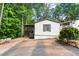 Inviting home featuring a covered porch and landscaped front yard at 164 Chickasaw Ln, Austell, GA 30168