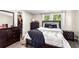 Nicely staged main bedroom with a walk-in closet and natural light at 164 Chickasaw Ln, Austell, GA 30168