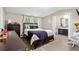 Comfortable main bedroom adjacent to the en-suite bathroom at 164 Chickasaw Ln, Austell, GA 30168