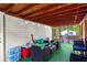 Relaxing screened porch with comfortable seating and string lights at 164 Chickasaw Ln, Austell, GA 30168