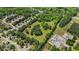 Overhead view of acreage close to houses, boasting natural beauty and close proximity to neighborhood amenities at 2932 Highway 20 Se, Conyers, GA 30013