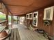 Rustic, covered porch with a charming outdoor seating area at 2932 Highway 20 Se, Conyers, GA 30013