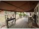 Covered back porch with rocking chairs at 2932 Highway 20 Se, Conyers, GA 30013