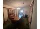 Traditional dining room with a large wooden table and decorative chandelier at 2932 Highway 20 Se, Conyers, GA 30013