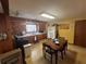 Functional kitchen with wood cabinets, laminate countertops, and a cozy dining area for everyday meals at 2932 Highway 20 Se, Conyers, GA 30013