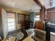 Eat-in kitchen with wood cabinets and plenty of natural light at 2932 Highway 20 Se, Conyers, GA 30013