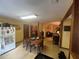 Cozy eat-in kitchen with dining table that flows into the living room at 2932 Highway 20 Se, Conyers, GA 30013