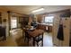 Classic kitchen featuring wood cabinetry, ample counter space, and a breakfast nook with natural light at 2932 Highway 20 Se, Conyers, GA 30013