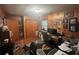 Cozy office space with wood paneling, a desk, and comfortable seating for a productive work environment at 2932 Highway 20 Se, Conyers, GA 30013