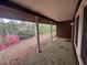 View from porch to landscaped yard with blooming azaleas at 2932 Highway 20 Se, Conyers, GA 30013
