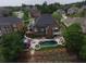 Expansive backyard features a sparkling pool, patio area, and lush green lawn at 3855 Greenside Ct, Dacula, GA 30019