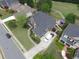 Well-manicured lawn leads to a private backyard oasis, complete with a pool and patio area at 3855 Greenside Ct, Dacula, GA 30019