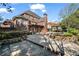 Beautiful backyard with pool, hot tub, patio and manicured lawn create a private oasis at 3855 Greenside Ct, Dacula, GA 30019