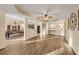 Spacious basement with light wood floors, a pool table, and custom built-ins at 3855 Greenside Ct, Dacula, GA 30019