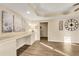 Basement office space with custom built-ins, and decorative wall art at 3855 Greenside Ct, Dacula, GA 30019