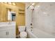 Bathroom featuring a tub, updated fixtures, and a large mirror over the vanity at 3855 Greenside Ct, Dacula, GA 30019