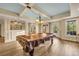 Game room with pool table, custom ceiling, and view to the outdoors at 3855 Greenside Ct, Dacula, GA 30019