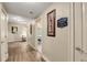 Hallway with wood floors and unique decor at 3855 Greenside Ct, Dacula, GA 30019