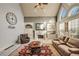 Living room with fireplace and vaulted ceiling at 3855 Greenside Ct, Dacula, GA 30019