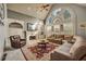 Bright living room with fireplace, built-ins, and large windows at 3855 Greenside Ct, Dacula, GA 30019
