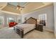 Spacious main bedroom with vaulted ceiling, plush carpet, and lots of natural light at 3855 Greenside Ct, Dacula, GA 30019