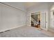 Spacious office with french doors, carpet, neutral paint, and view of the home foyer and staircase at 3855 Greenside Ct, Dacula, GA 30019